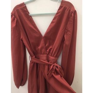 Never Worn Fashion Nova Romper with tags!